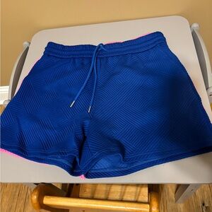 1 Blue and 1 hot pink Women's Shorts. Sold as one.
